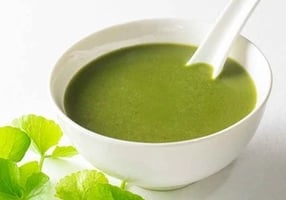 avocado-soup-in-a-white-bowl-with-spoon