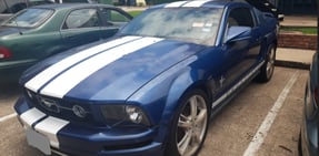 Junk car mustang with stripes