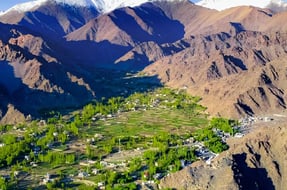 a mountain view of a valley with a view of a valley