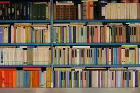 a book shelf with many books on it