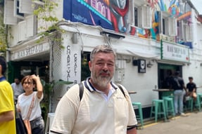 Image of Author: Jason A Ellis traveling the world, local area in Singapore