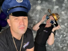 Pimp and police props in the digital photo booth for Daune's 60th birthday in Brisbane.