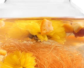 a glass teapot with a glass teapot and a glass teapot