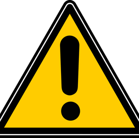 a yellow warning sign with a warning sign