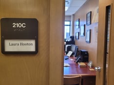 Image of office door, 210C, with door open. Label for office reads: Laura Hooton
