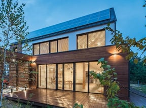 a house with solar panels and solar panels