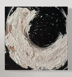 a painting of a black and white circle