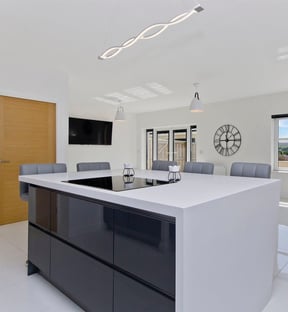 Luxurious bespoke kitchen in East Kilbride featuring Hi-Max countertops and integrated appliances