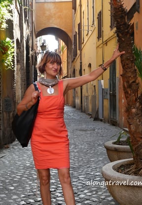 author wearing a bright dress, as an extra item allowable for light and smart packing