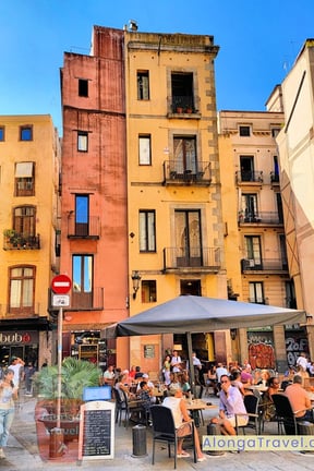 a street cafe on a square in front of Basílica de Santa Maria del Pi in Barcelona