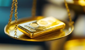 gold bar on precision scale