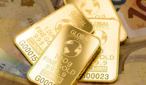 gold bars in pile for retirement