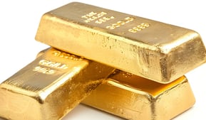 gold bullion bars in a stack