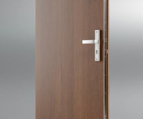 a door with a wooden door and a door handle