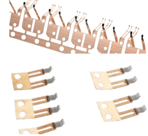 a group of metal parts of a set of four different types of electrical components