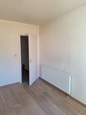 Photo avant rénovation de l'appartement de Knokke vue de la chambre principale