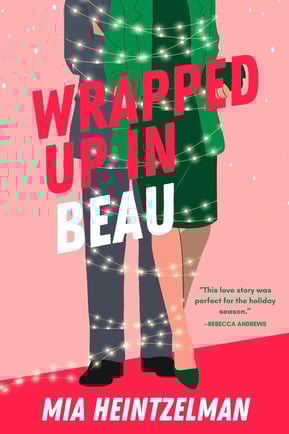 Wrapped Up in Beau - a woman in a green dress and a man in a gray suit tied with Christmas lights