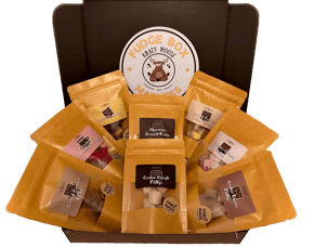 Image of the Ultimate Fudge Box, a box containing 8 pouches of Krazy Moose fudge.