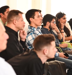 Consultation (group of individuals listening to a speaker)