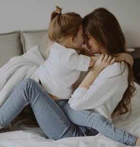 Family Therapy (mom and child embracing)