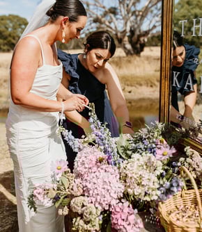 Official marriage documents being signed withNoosa and Sunshine Coast celebrant Nikki Bowden