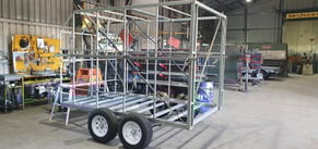 Worker at Trailers 2000 working on the skeleton of the Pimp Your Party trailer.