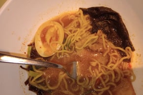a bowl of noodles with noodles and noodles