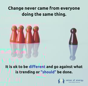 a group of red pawns with one brown and a quote about difference