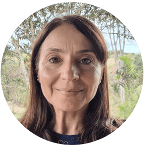 a woman with long hair and a blue dress