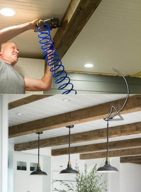 a man is fixing a kitchen ceiling light fixture