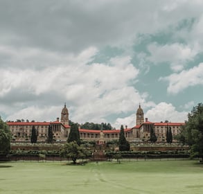 a large building with a large building in the background