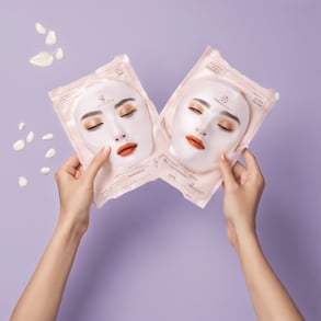 a close up of a person holding a toothbrush