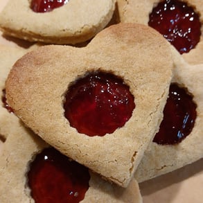 a plate of cookies and jelly jellys on a plate