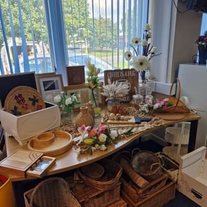 A table in our gift room displaying secondhand goods for sale