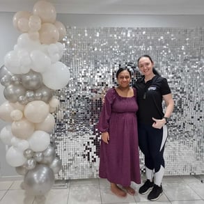 Carly with Denise's sister who organised the silver shimmer wall for her graduation, Brisbane.