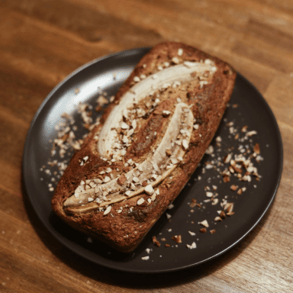 a piece of cake with a slice of banana bread