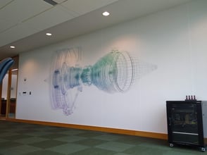 Art of the engines that Rolls Royce makes done on a full coverage wall wrap