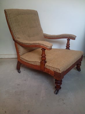 Antique Victorian armchair traditionally upholstered with a stitched hair pad and covered with hessian