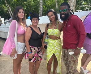a group of people standing around a group of people
