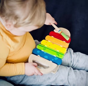 kid with musical instrument