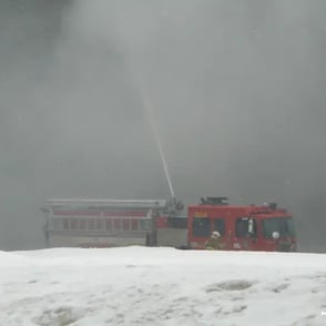 Incendie du Manèege., camion dans fumée.