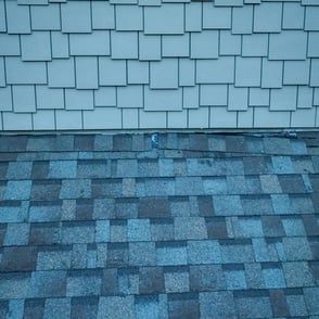 Photography inspection image of roof shingles coming loose