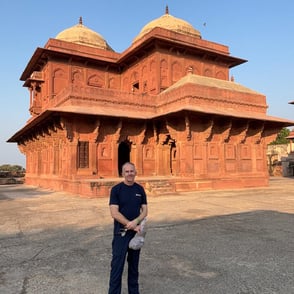 A happy guest enjoying the Palatial complex at Fatehpur Sikri