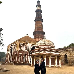 Our guests enjoying the tour of Qutub Minar with our Delhi-expert