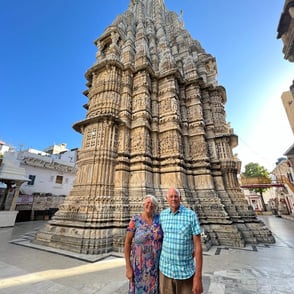A happy couple enjoying a temple's visit in Udaipur