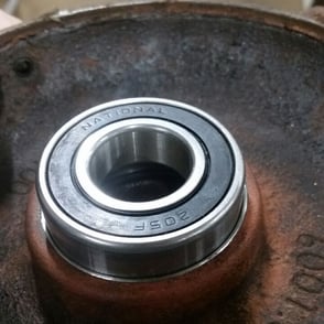 Motor housing gets a new bearing after putting in a sleave