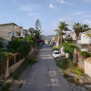 Drone viw from the street of the coliving for digital nomds, Co.bay Sicily, Italy