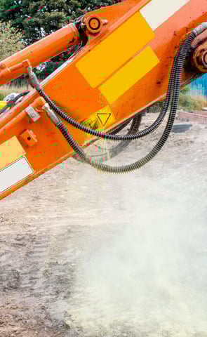 hydraulic hose line leaking spraying hydraulic oil before onsite repair in lakeland florida
