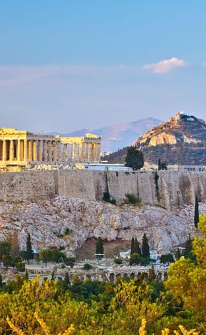 a view of a city with a view of the acropoliss of the ac