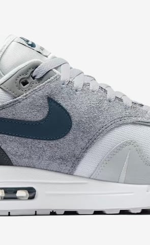 Nike Air Max 1 'London' sneaker in Urban Grey with Sail midsole, gum outsole, and deconstructed Swoosh design